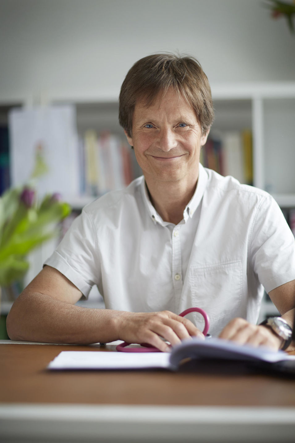 Präsentation der Kinderarztpraxis Dr. Christian Haas in München mit Mitarbeiterinnen und Patienten/-innen.